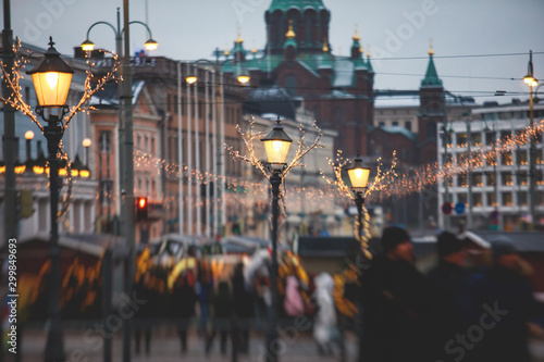 Christmas decorations in the historical center streets of Helsinki, with evening light illumination, concept of Christmas in Finland, with Cathedral, market square, christmas tree