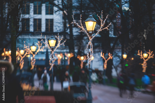 Christmas decorations in the historical center streets of Helsinki, with evening light illumination, concept of Christmas in Finland, with Cathedral, market square, christmas tree