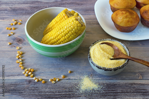 Boiled corn cobs, cornmeal and cornbread prepared as a muffin ( proja ). Rustic background