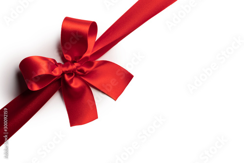 Red gift bow on white