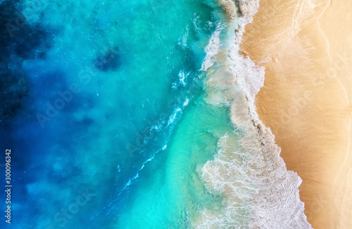 Coast and waves as a background from top view. Turquoise water background from top view. Summer seascape from air. Travel - image