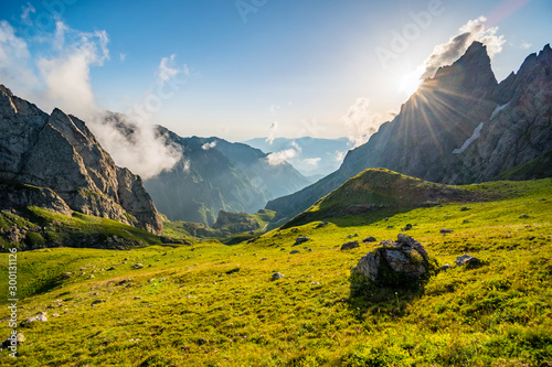 Sun rays and clouds in mountains of Magana valley, Egrisi mountains, Svaneti, Georgia