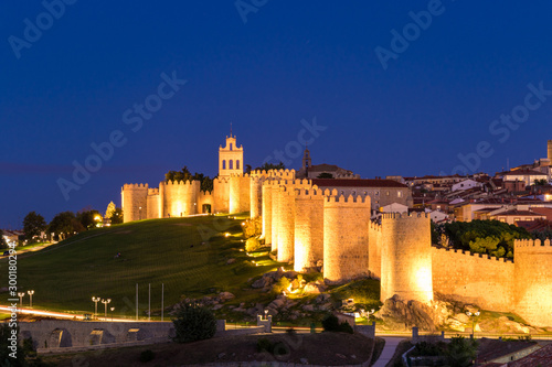 Avila medieval wall by night