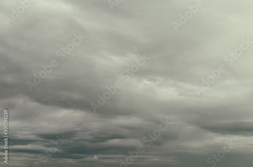Soft background with stratus clouds. Dramatic cloudscape under cinematic color filter.