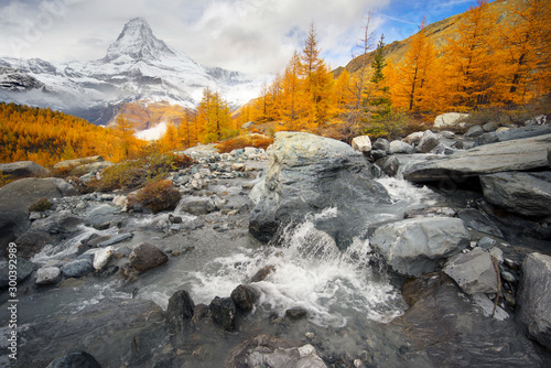 Matterhorn over a mountain stream in autumn
