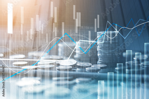 Financial stock market graph and rows of coins growth, abstract and symbol for finance concept, business investment and currency exchange, on blue background.