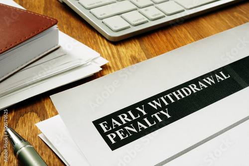 Early withdrawal penalty letter on the desk.