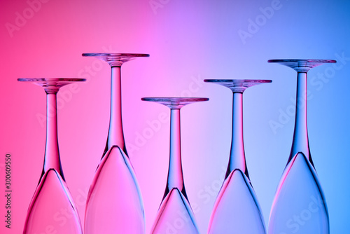 inverted glasses on a colored background