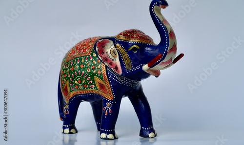 ceramic elephant painted with indues motifs