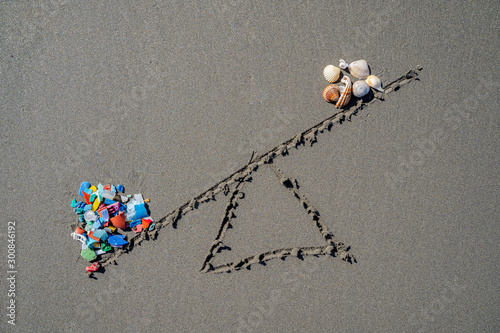 Balance between micro-plastic waste and marine life. Ecology disaster concept photography