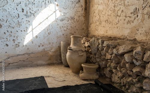 Clay jugs in the reconstructed building of the Byzantine era in the archaeological site Ancient Shiloh in Samaria region in Benjamin district, Israel