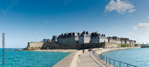 historic French town of Saint-Malo in Normandy seen from the harbor wall jetty