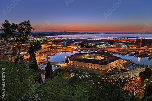 Ancona, Marche, Italy: night landscape of the bay with the ancient lazaretto Mole Vanvitelliana, pentagonal architecture built in 18th-century as a quarantine station 