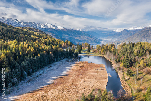 Alpine lake in mountain, natural reserve in Valtellina. Pian di Gembro - Alps