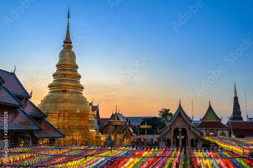 The light of the Beautiful Lanna lamp lantern are northern thai style lanterns in Loi Krathong or Yi Peng Festival at Wat Phra That Hariphunchai is a Buddhist temple in Lamphun, Thailand.
