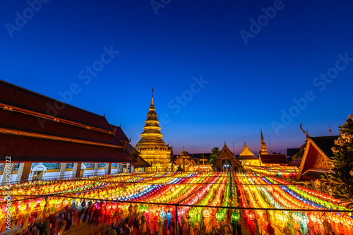 The light of the Beautiful Lanna lamp lantern are northern thai style lanterns in Loi Krathong or Yi Peng Festival at Wat Phra That Hariphunchai is a Buddhist temple in Lamphun, Thailand.