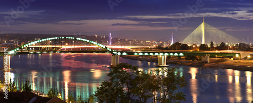 Panorama view of Belgrade, Serbia while sunset, it's main river Sava and all bridges connecting two banks of the town