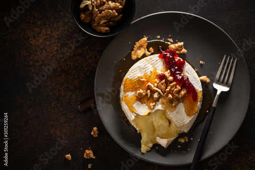 Baked camembert with walnuts and cranberries