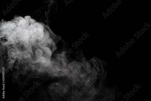 Abstract powder or smoke isolated on black background.