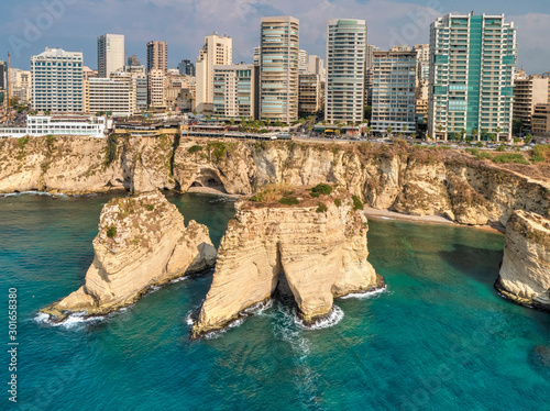 Rouche rocks in Beirut, Lebanon in the sea during daytime. Pigeon Rocks in Mediterranean sea.