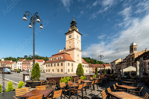 The famous Sfatului square in the heart of Brasov medieval old town in Romania on a sunny summer day
