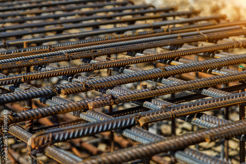 Industrial background. Rebar texture. Rusty rebar for concrete pouring. Steel reinforcement bars. Construction rebar steel work reinforcement. Closeup of Steel rebars.