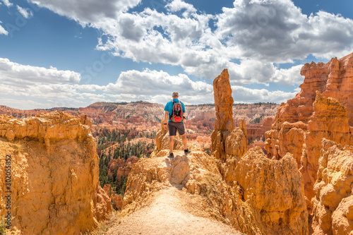 Male tourist enjoying the scenic view at the Bryce Canyon, Utah