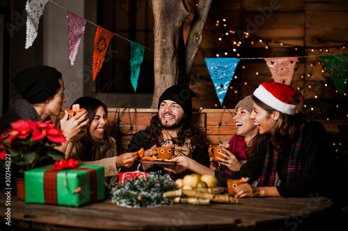 Mexican Posada friends celebrating Christmas in Mexico and having fun