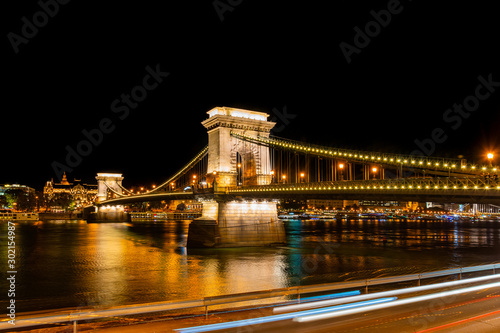 Budapest, Hungary-October 01, 2019: A night view of Szechenyi Chain Bridge over the Danube River in Budapest. It is the oldest and most famous road bridge in Budapest. Was built between 1839 and 1849.