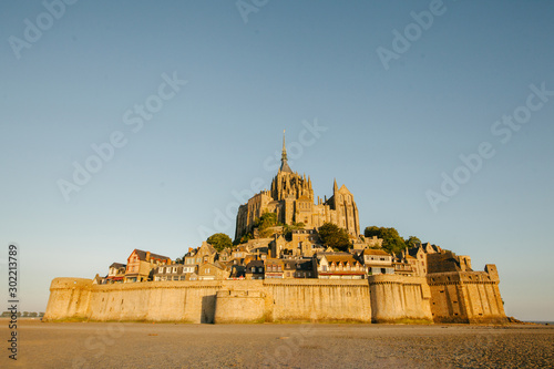 Le Mont Saint-Michel tidal island in beautiful twilight at dusk, Normandy, France