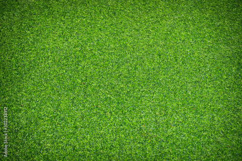 Artificial green grass texture background.