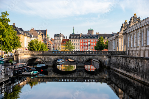 Copenhagen, Denmark. View of old Marmorbroen or Marble bridge with the reflection. The historical center of the Danish capital.