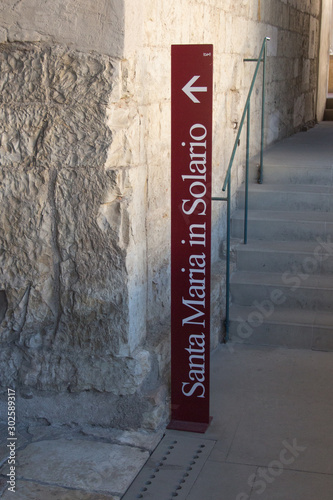 Signpost at the entrance of the Church Santa Maria in Solario, Brescia, Lombardy, Italy.