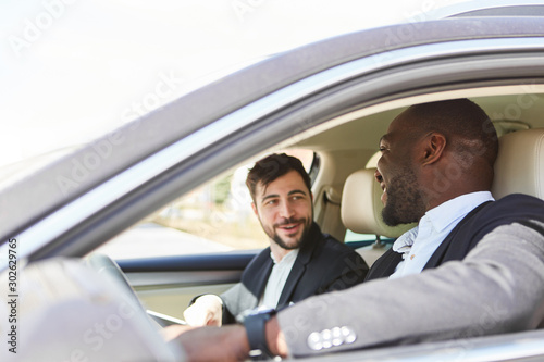 Business people in the car as a carpool