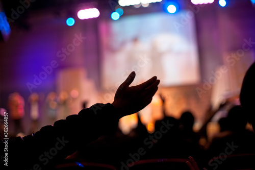 a hand in church worship