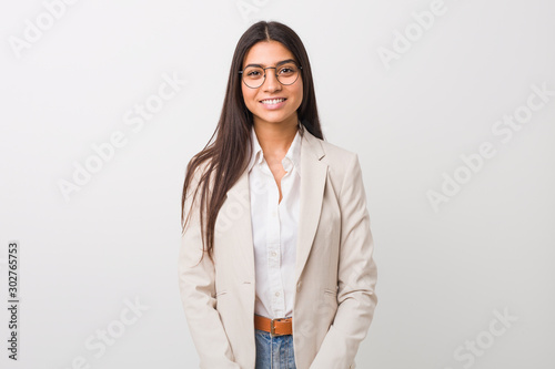 Young business arab woman isolated against a white background happy, smiling and cheerful.