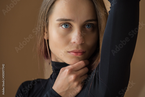 portrait of young pretty emotional and sexy girl with blue eyes