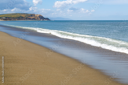 The coastline of the sandy beach of the sea shore.
