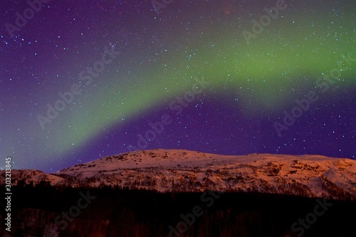 northern lights over snowy mountains, Lofoten