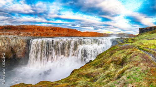 Dramatic sunset view of the most powerful waterfall in Europe called Dettifoss