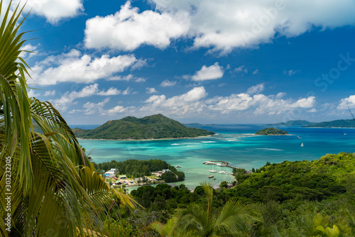 Scenic landscape view from top of fond ferdinand nature reserve in Praslin on Bay of St. Anne. Amazing views of Seychelles and Indian Ocean.