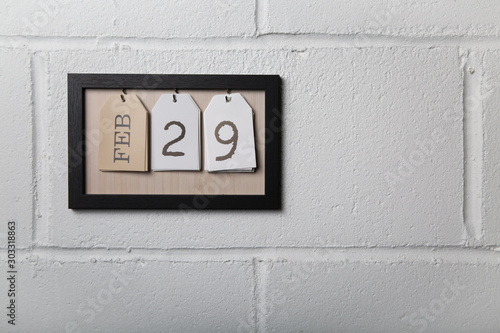 Wall Hanging Calendar in a Picture Frame Showing February 29 Leap Year