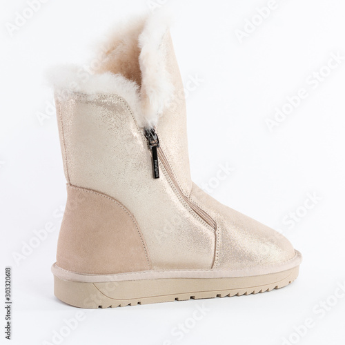 beige winter womens soft warm shoes made of suede and fur with a lock and flat shoes