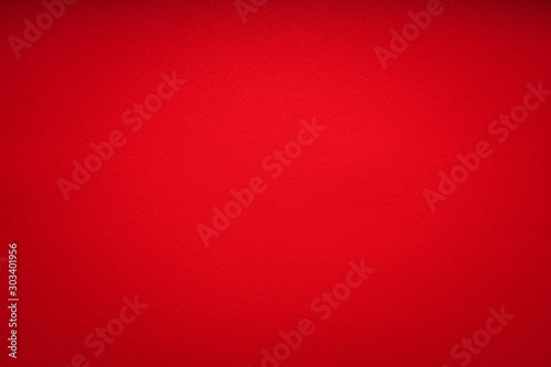 Grain dark red paint wall or red paper background or texture