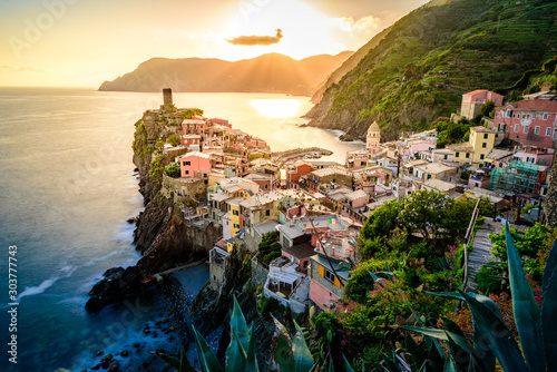 Vernazza - Village of Cinque Terre National Park at Coast of Italy. Beautiful colors at sunset. Province of La Spezia, Liguria, in the north of Italy - Travel destination and attraction in Europe.