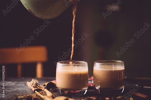 Masala tea ( Masala chai). A traditional hot drink in India and South Asia. Black tea with milk and spices