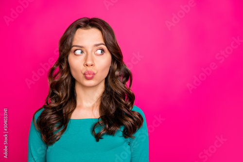 Photo of tender cute sweet wavy pretty charming youngster kissing you while pondering over her plans expressing love on her face isolated vibrant fuchsia color background