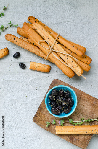 Grissini and olives (bread stick)