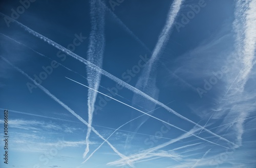 Chemtrails over the blue sky