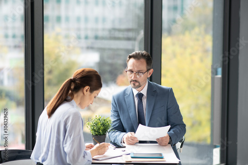 Businessman feeling involved in discussion with business partner